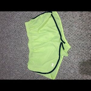 Neon Under Armour running shorts